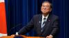 Japan’s prime minister announces resignation two years before term ends