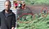 Fugitive New Zealand father Tom Phillips is KILLED in gun battle with cops after four years living in the wild near Marokopa: One child is in custody and a desperate search is launched for two others 'and a possible baby' - as wounded cop fights for life
