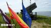 Who is in Nato and what are Article 4 and Article 5?
