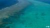 China says intercepted Philippine ships at disputed South China Sea shoal