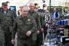 Putin inspects joint Russia-Belarus war games in military uniform