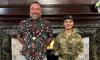 Mayor is blasted for turning up at military parade in Hawaiian shirt, shorts, trainers and no socks