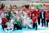 Bahrain edge Kuwait to reach main round