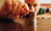 What effects will the rise in the minimum wage have on earnings in Serbia?