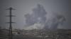 Gunman kills 2 at Israeli-run crossing between West Bank and Jordan