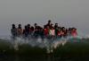 UK Would Need to Deport 2,000 Migrants a Week to Stop Smugglers