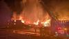 Crews work overnight to contain large fire at textile plant