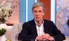 John Stapleton's GMTV co-star Kate Garraway leads tributes to 'rock solid broadcaster and the ultimate gentleman' following broadcaster's death after battle with Parkinson's