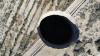 Giant sinkhole in Chilean mining town haunts residents, three years on