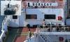 Arrests are made after French special forces boarded Russian ghost ship 'linked to Denmark airport chaos' - as drones are spotted 'spying in Germany'