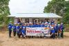 Travel agency staff roll up sleeves to build homes for two Orang Asli families
