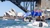 Pro-Israel convoy descends on Sydney Harbour as pro-Palestine protesters march through CBD