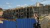 How building permits are issued and illegal construction becomes legal