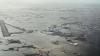 More evacuees from coastal Alaska villages inundated by high surf last weekend are arriving in Anchorage.