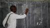 Cameroon governing party says one of its offices was set on fire as election tensions rise