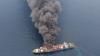 Ship on fire after being hit by projectile in Gulf of Aden, says British military