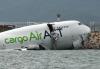 Cargo plane slides off HK runway, kills 2 airport staff