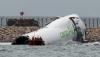 Hong Kong cargo plane skids off runway, two airport staff killed