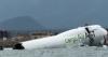 Two dead after cargo plane skids off Hong Kong runway