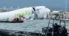 Emirates cargo jet skids off Hong Kong runway into bay, killing 2 airport workers
