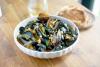Steamed mussels get bite from ‘nduja, a soft and spicy sausage from Southern Italy