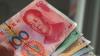 Yuan topples dollar in China's trade, but hits speed bumps