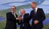 Awkward moment Prince William and Sir Keir Starmer appear to fumble handshake alongside Brazil's president at green summit