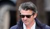 Ex-footballer Joey Barton guilty of posting grossly offensive messages on social media