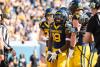 WVU pass rusher Curtis Jones Jr. helps on offense, scores two touchdowns against Colorado