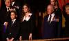 King Charles appears moved during heartfelt rendition of the national anthem at Festival of Remembrance - as he is joined by Prince George and the Princess of Wales in paying emotional tribute to the fallen