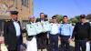 Traffic Police distribute food aid, honor families of martyrs in Sana'a