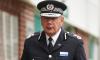 Former police chief appears in court accused of fraud and misconduct in public office after allegedly lying about his military service
