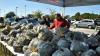 See photos as hundreds line up for Farm Share free food distribution in Palm Bay