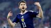 Scotland beaten in Greece but Denmark draw keeps World Cup dream alive