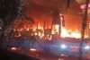 Three buses set ablaze, crude bombs blast in Dhaka at night