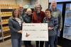 Arlington High School class of ‘65 donates reunion money to food bank