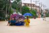 Thailand floods kill 13, leaving people stranded and roads submerged