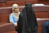 Australian senator banned for wearing burqa in protest blasted as racist