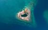 A First Look Inside Bullock Island , Reggie Bullock’s Heart-Shaped Belizean Escape