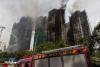 Hong Kong police raid company linked to Wang Fuk Court fire
