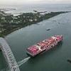 A Taiwanese cargo ship sails out of the Panama Canal on the Pacific side