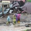 Rescuers intensify search for victims after floods and landslides kill 69 people