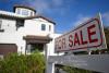Homes are languishing on the market and forcing sellers to reduce prices as housing market cools from red-hot pandemic