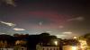 Scientists baffled as mysterious halo of red light appears over Italian town
