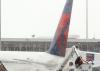 Plane Slides Off Icy Runway At Des Moines International Airport