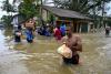 Race to get aid to Asia flood survivors as death toll tops 1,200