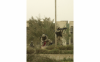 From the archives: Marines cut the Iraqi flag from a pole in Baghdad, 2003
