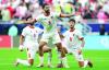 Jordan and Iraq into quarters as Algeria win big