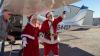 Volunteer pilots bring, Santa, gifts to title I schools on Utah-Arizona border