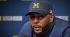 University of Michigan football coach detained after being fired